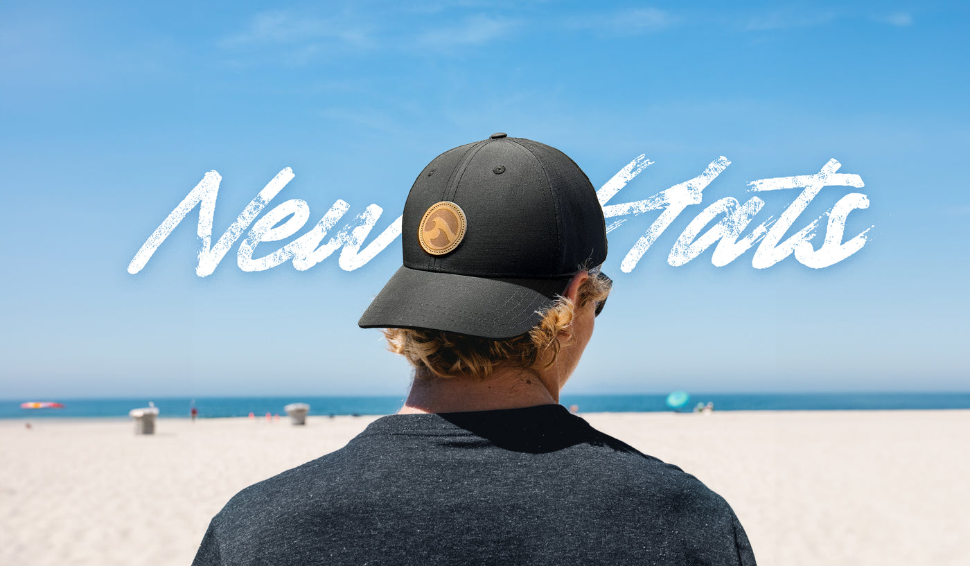 A man stares at the horizon while wearing a Costazul Cap Backwards